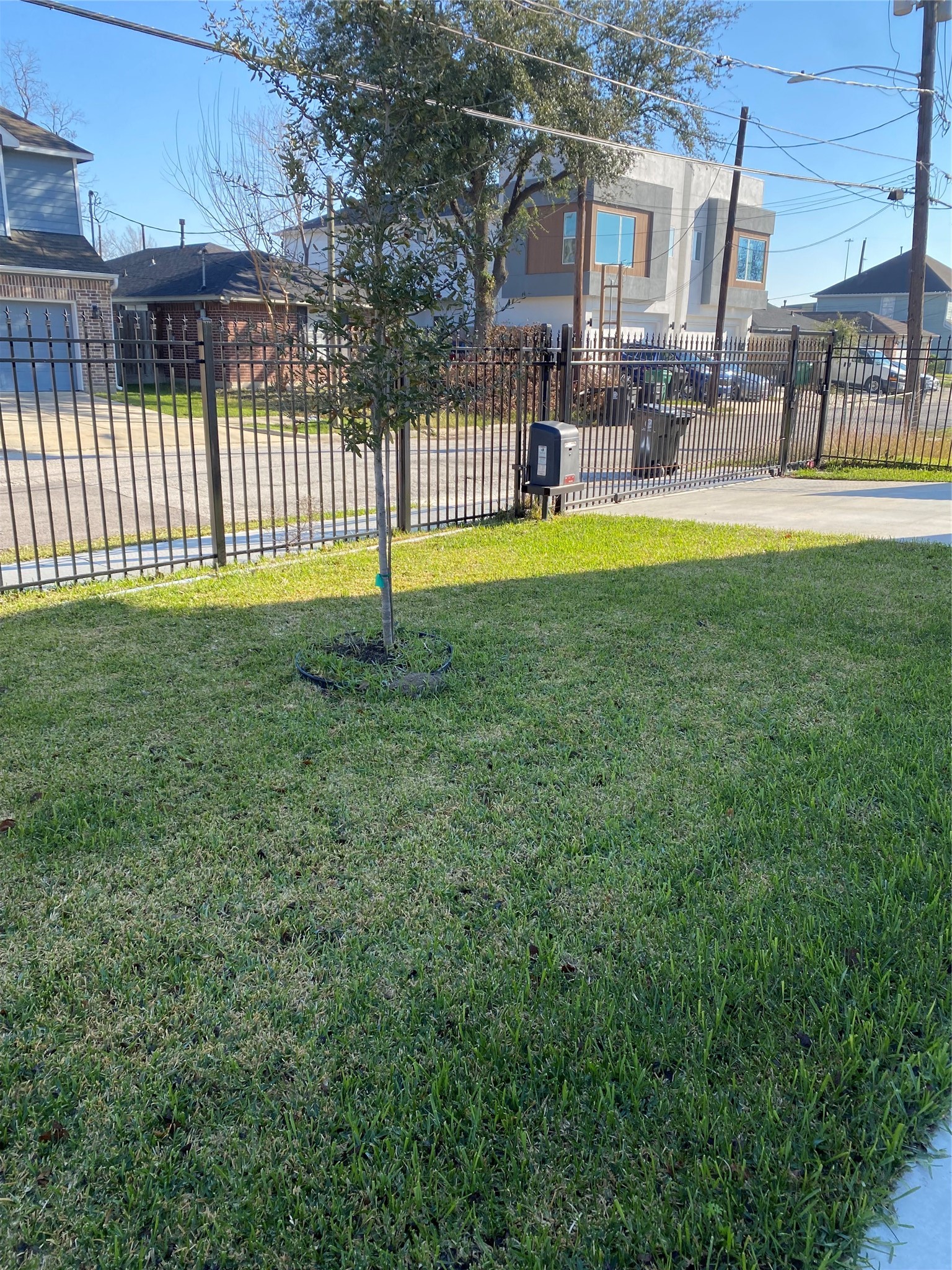 3604 Dennis Street Houston, TX 77004 - Photo 16 of 20 a view of a house with a swimming pool and sitting area