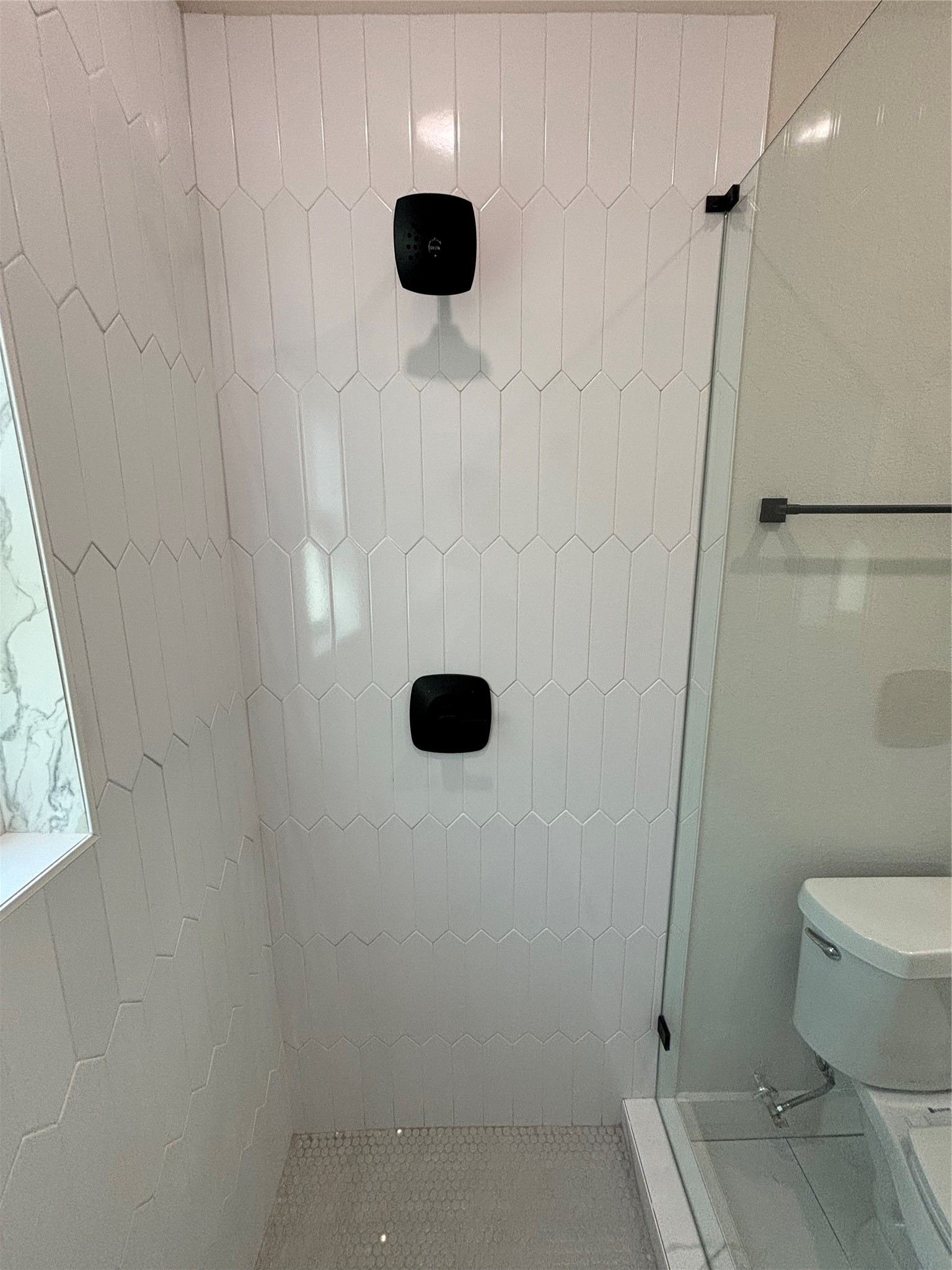 3604 Dennis Street Houston, TX 77004 - Photo 9 of 20 a bathroom with a shower toilet and a sink