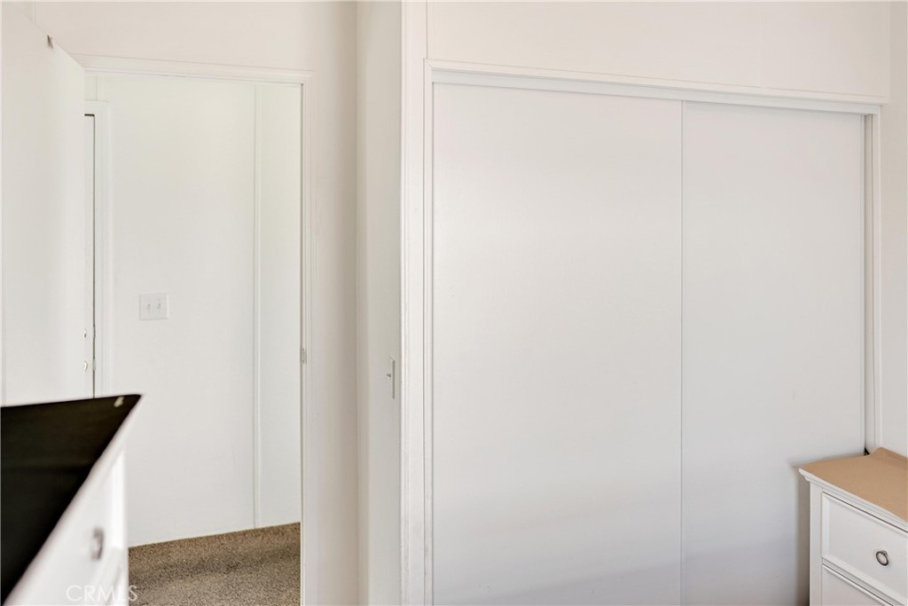 22601 Bear Valley Road, Unit 17 Apple Valley, CA 92308 - Photo 8 of 36 a view of a hallway