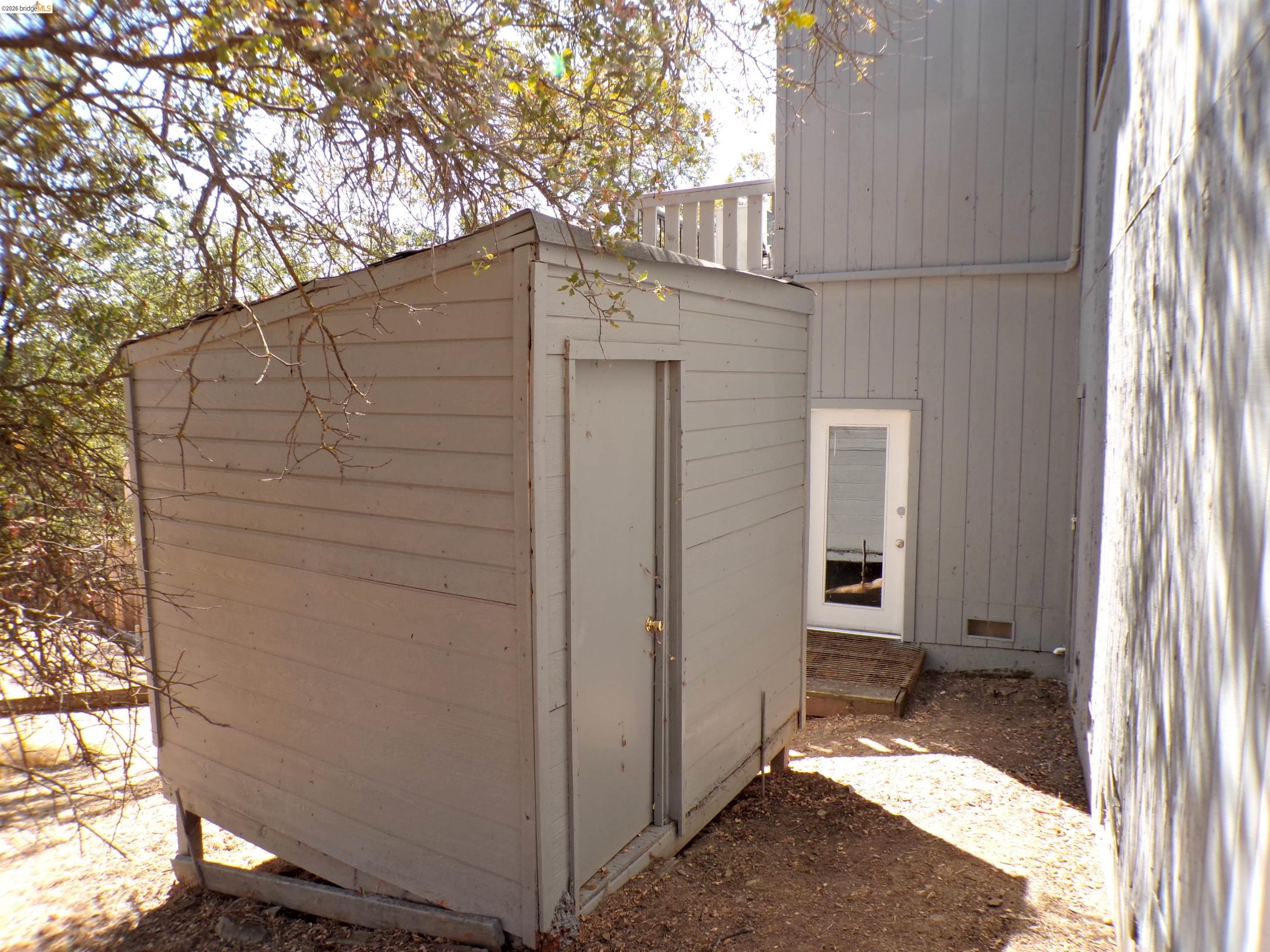 4271 Council Trail Copperopolis, CA 95228 - Photo 27 of 32 Exterior storage shed with horizontal siding