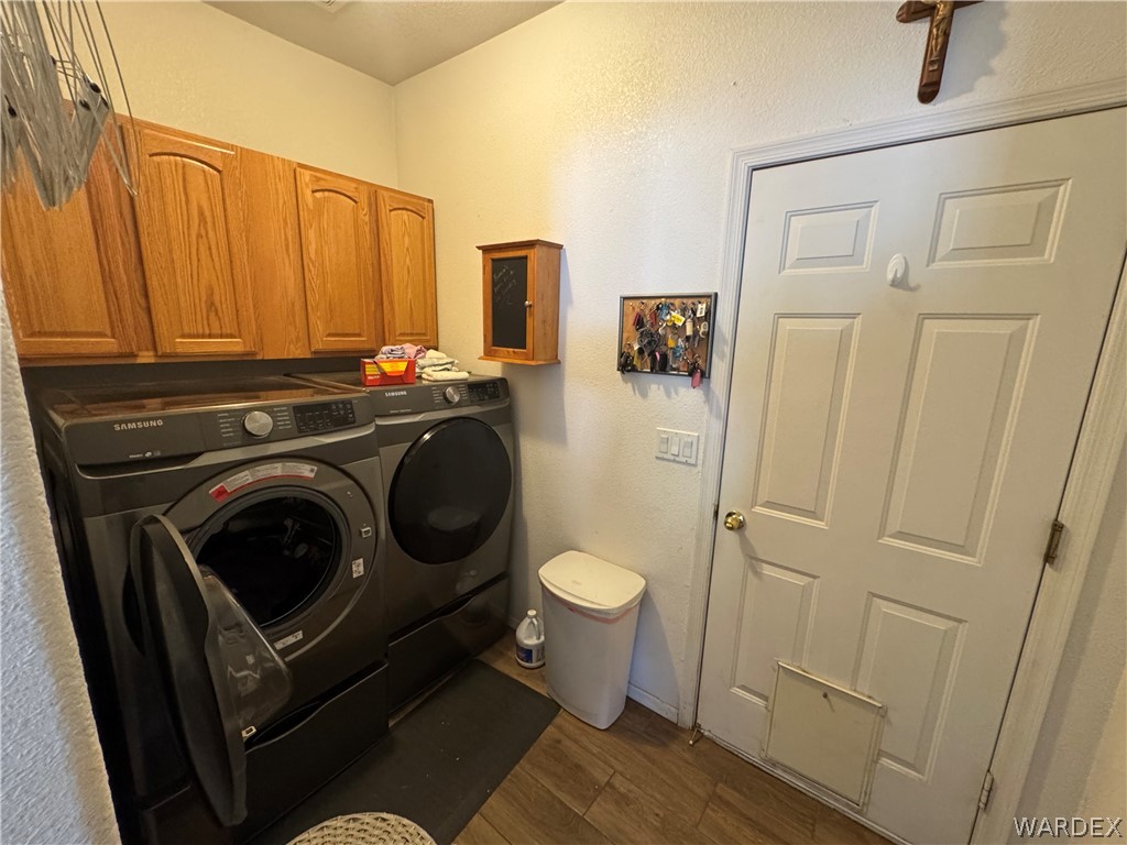 4029 Roma Road Kingman, AZ 86401 - Photo 35 of 90 This utility space includes overhead wood cabinetry, providing storage solutions