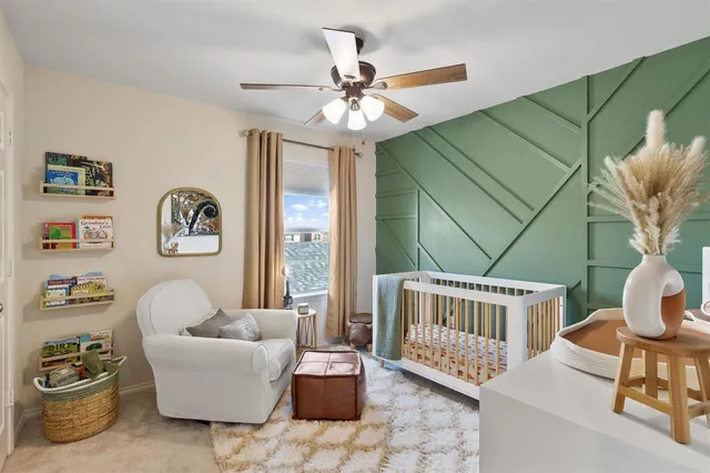 a bedroom with furniture and a window