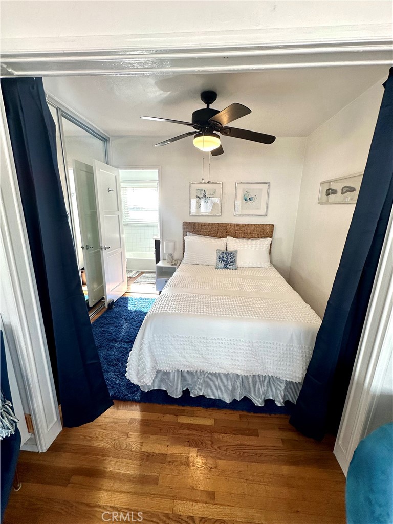 116 Avenida Serra, Unit 4 San Clemente, CA 92672 - Photo 13 of 23 a bedroom with a bed and a window