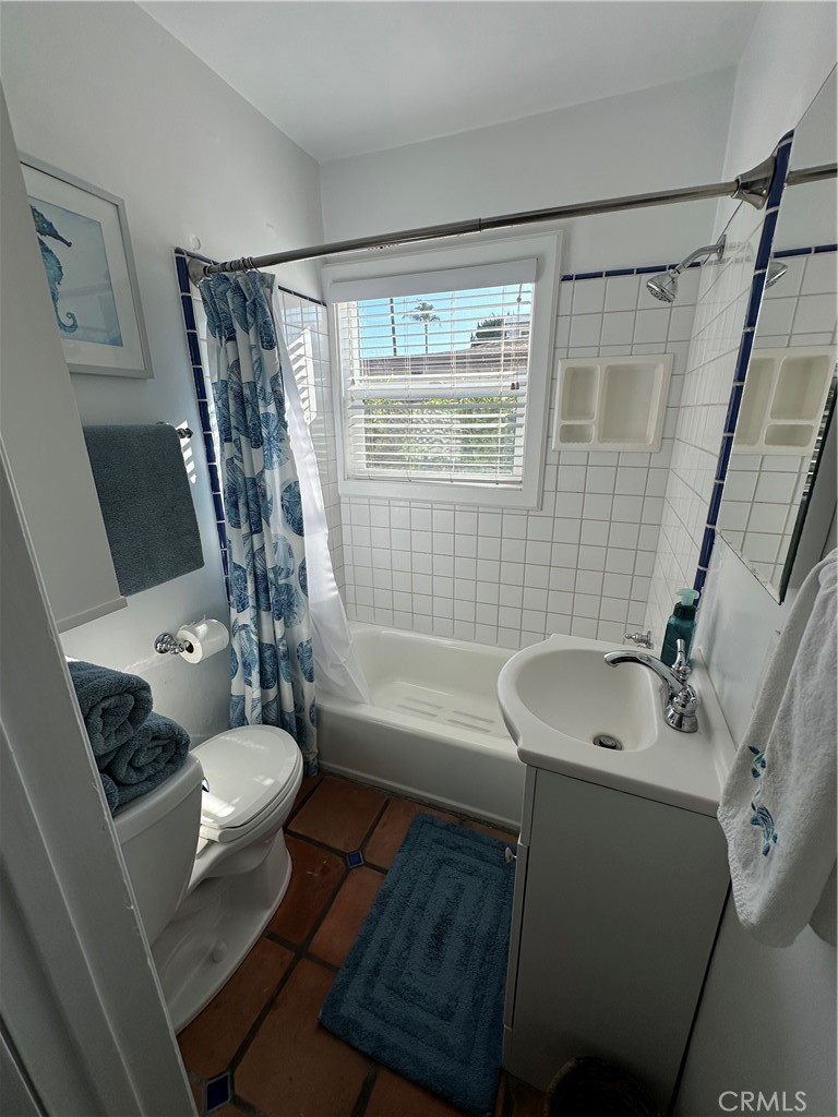 116 Avenida Serra, Unit 4 San Clemente, CA 92672 - Photo 14 of 23 a bathroom with a sink toilet and shower