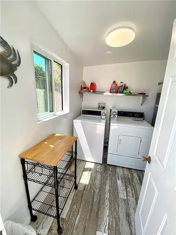 a view of a backyard with sitting area