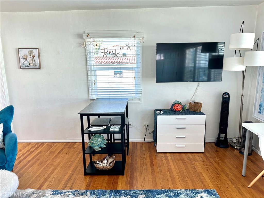 116 Avenida Serra, Unit 4 San Clemente, CA 92672 - Photo 5 of 23 a living room with furniture and wooden floor