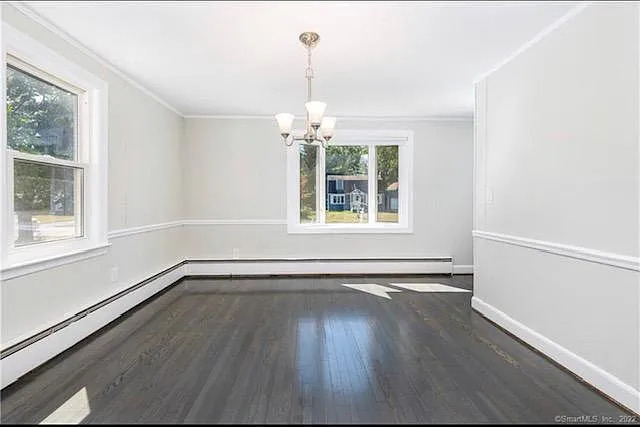 22 Fern Street Rocky Hill, CT 06067 - Photo 14 of 24 a view of an empty room with wooden floor and a window
