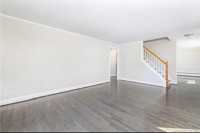 22 Fern Street Rocky Hill, CT 06067 - Photo 15 of 24 a view of an empty room with wooden floor