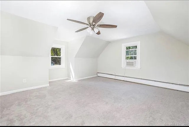 22 Fern Street Rocky Hill, CT 06067 - Photo 18 of 24 an empty room with windows and ceiling fan