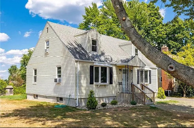 22 Fern Street Rocky Hill, CT 06067 - Photo 2 of 24 a view of a house with a yard
