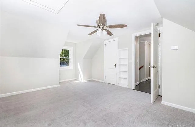 22 Fern Street Rocky Hill, CT 06067 - Photo 21 of 24 an empty room with a window and a ceiling fan