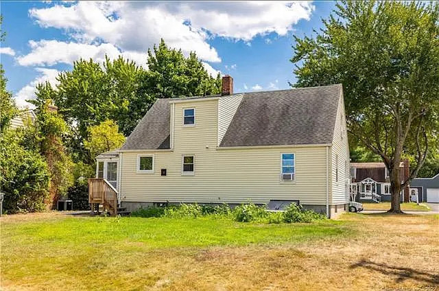 22 Fern Street Rocky Hill, CT 06067 - Photo 3 of 24 a aerial view of a house with a yard