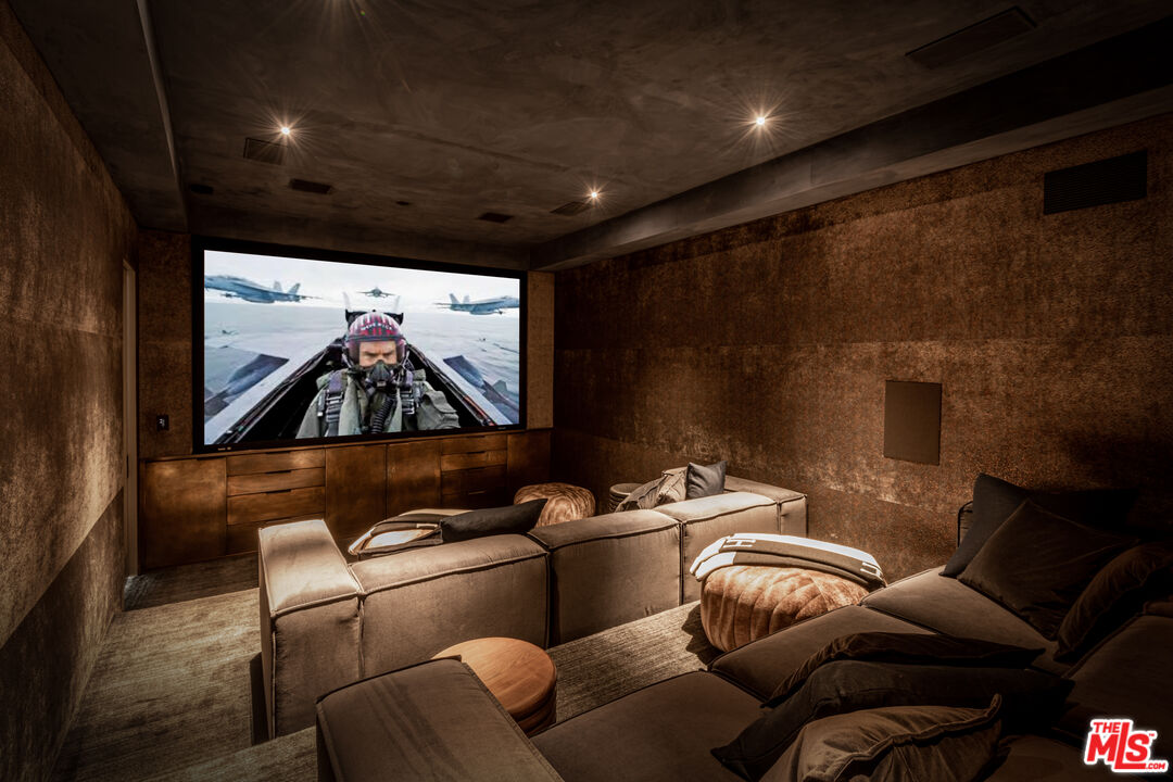 9152 Janice Place Beverly Hills, CA 90210 - Photo 15 of 18 a projector room with a couch