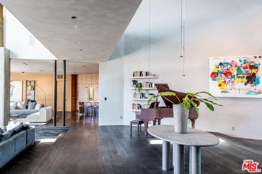 9152 Janice Place Beverly Hills, CA 90210 - Photo 2 of 18 a living room with furniture and wooden floor