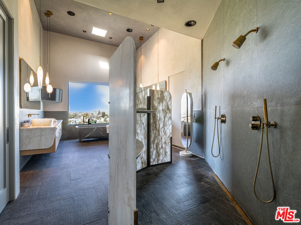 9152 Janice Place Beverly Hills, CA 90210 - Photo 9 of 18 a view of a living room and a bathroom