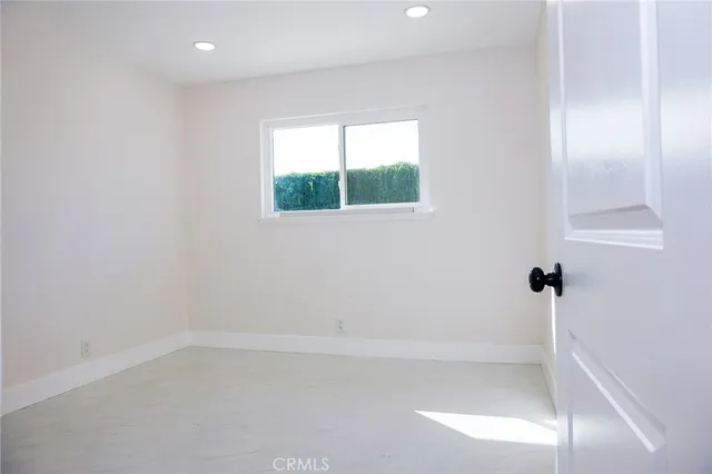 a view of room with floor to ceiling window