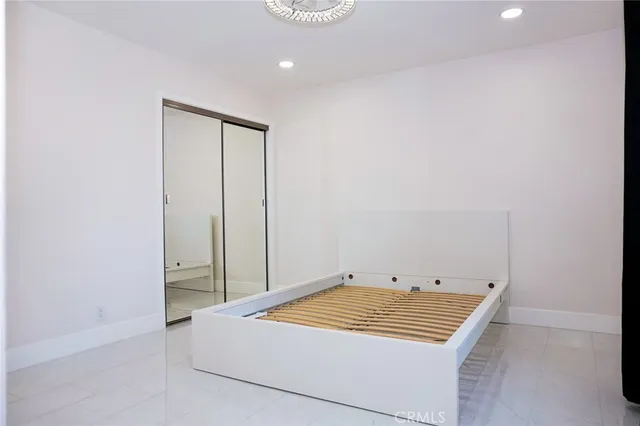 a bathroom with a toilet a sink and a shower