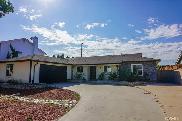 a view of a house with a patio