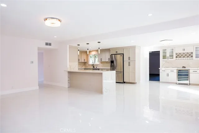 a view of a kitchen with a sink