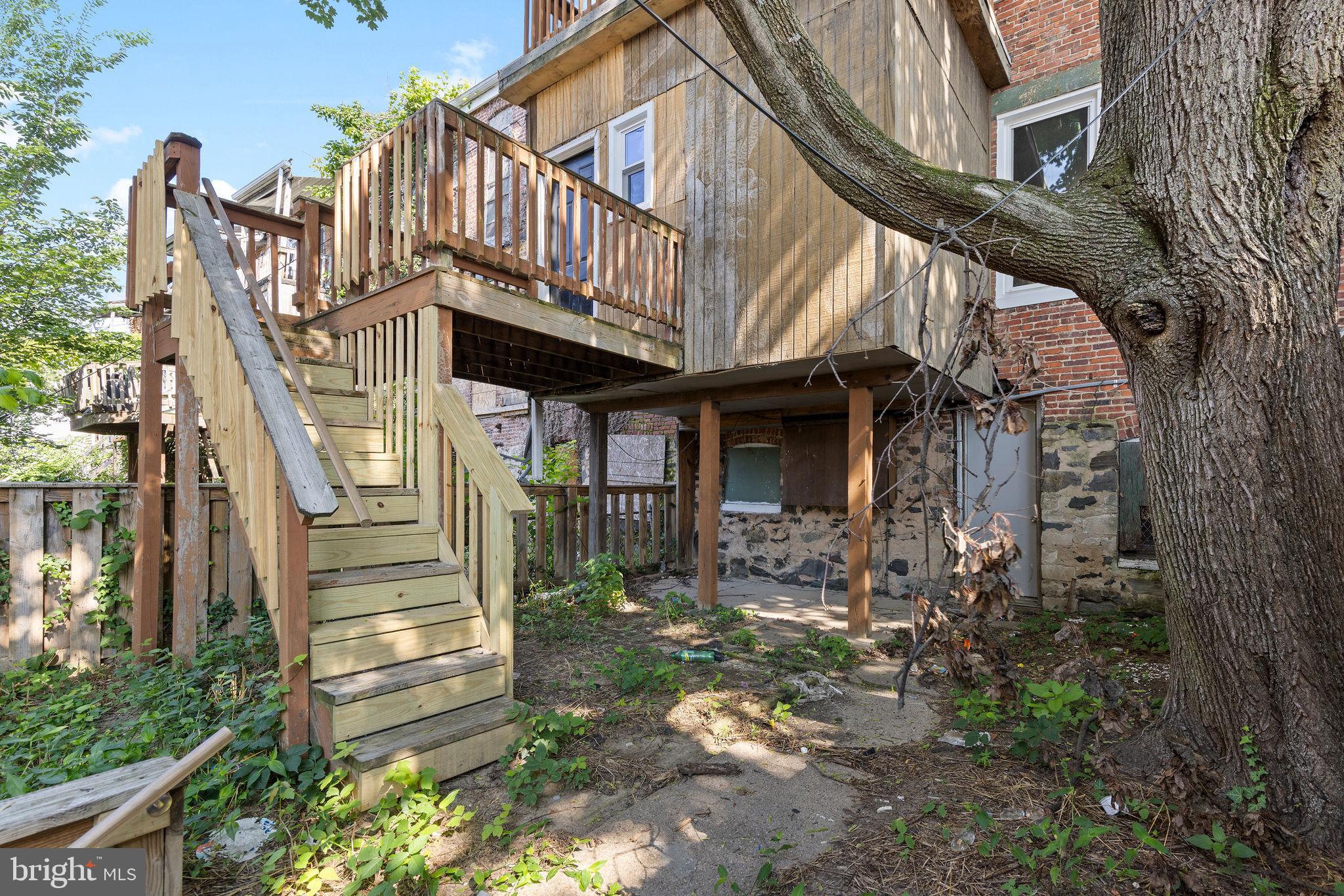 3003 Clifton Avenue Baltimore, MD 21216 - Photo 12 of 28 a view of a house with brick walls