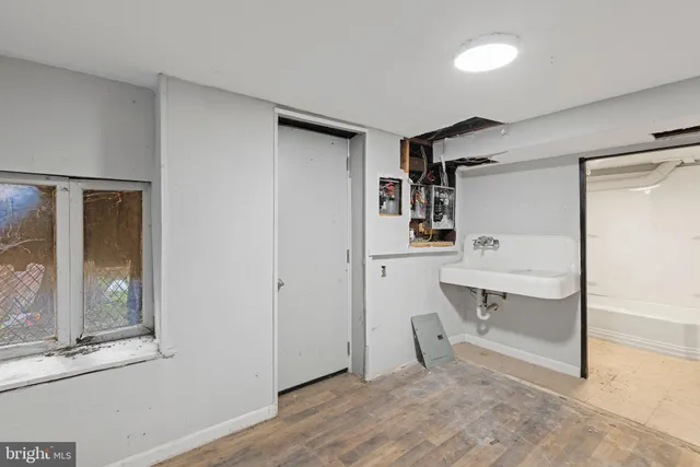 a bathroom with a sink toilet and vanity