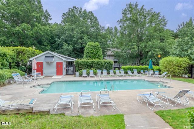 1312 Hillbrow Lane, Unit 203 Raleigh, NC 27615 - Photo 19 of 26 a front view of a house with garden