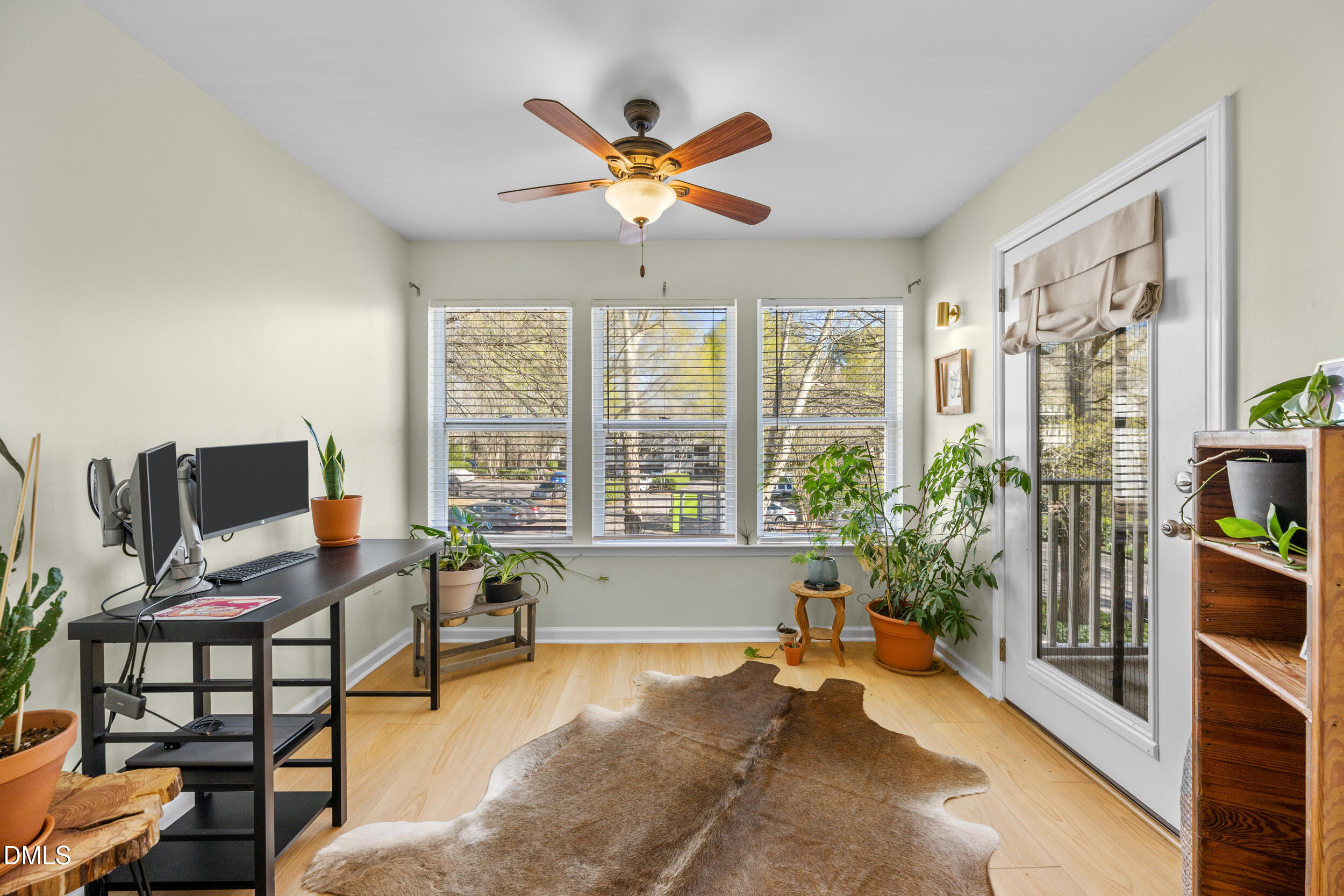 1312 Hillbrow Lane, Unit 203 Raleigh, NC 27615 - Photo 6 of 26 a work room with furniture and a large window