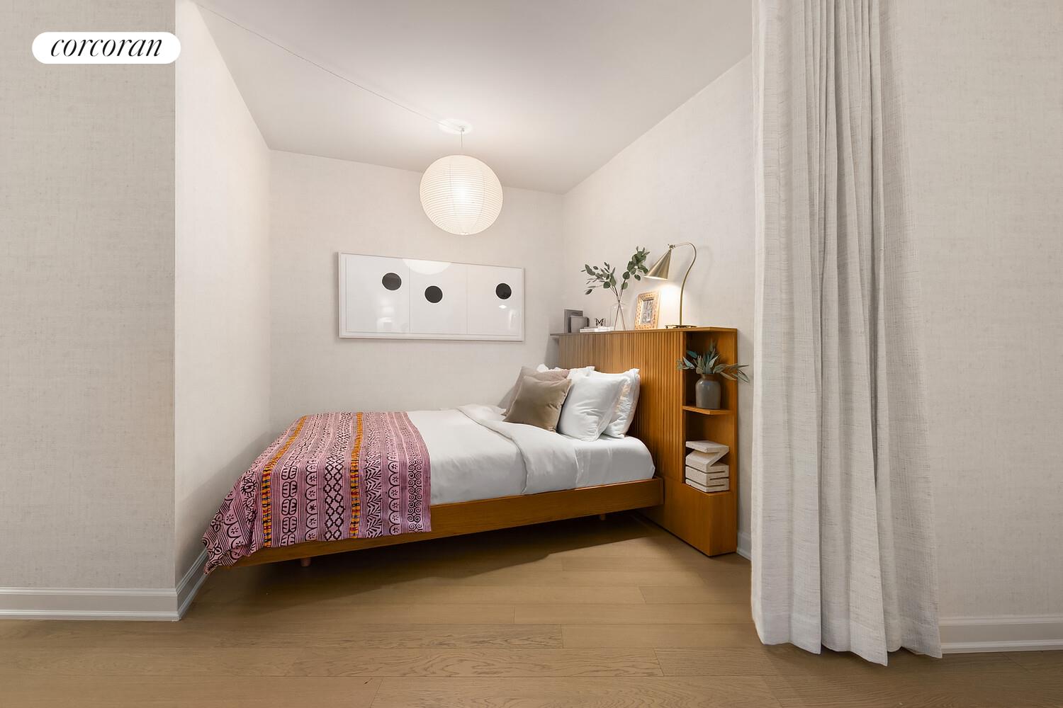 20 River Terrace, Unit 18Q Manhattan, NY 10282 - Photo 4 of 8 a bedroom with a bed and painting on the wall