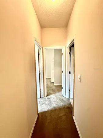 a view of a bathroom with tub and shower