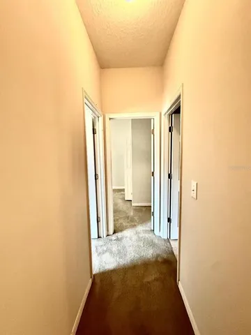 a view of a bathroom with tub and shower