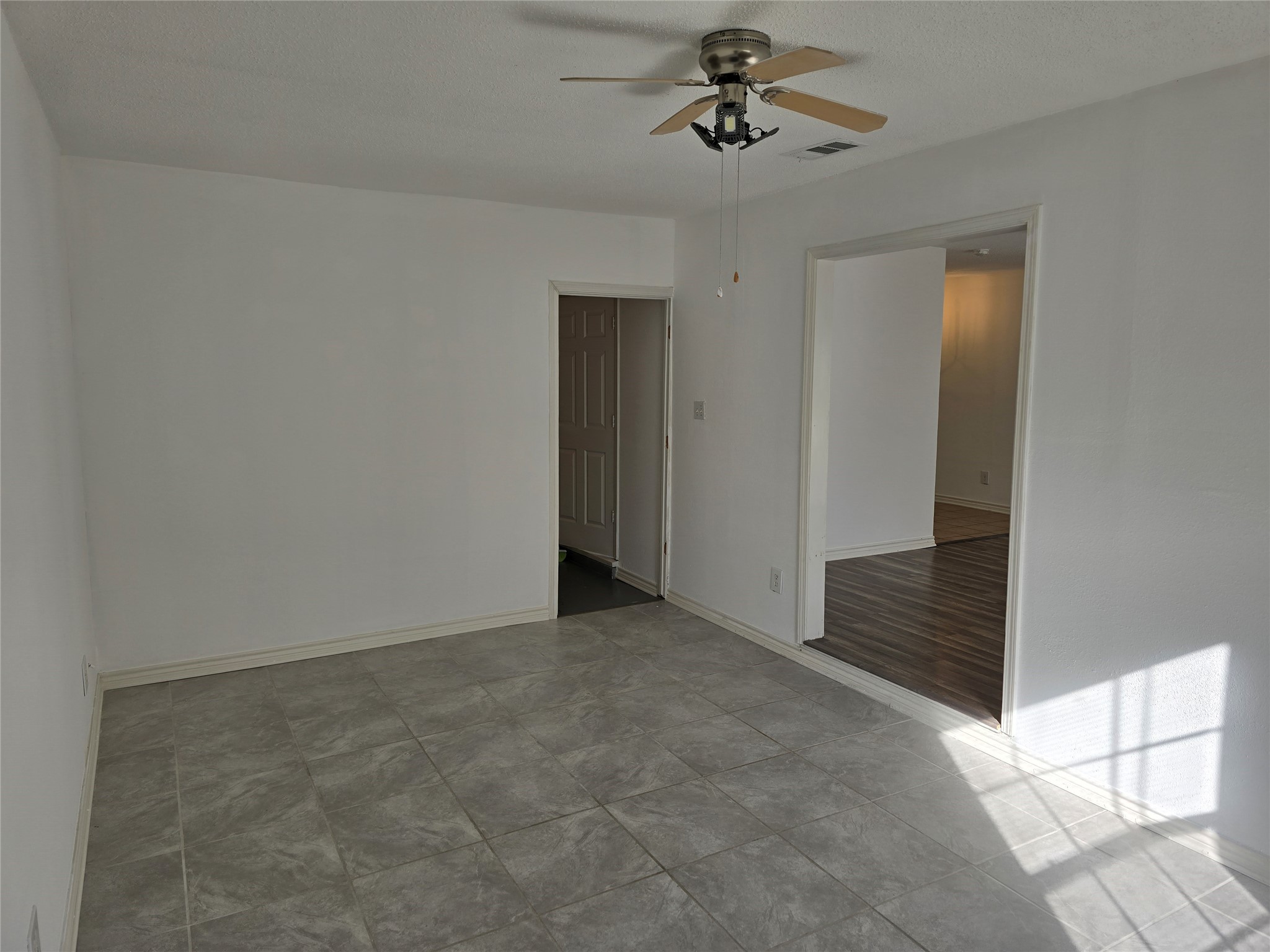 3619 Washington Street Pasadena, TX 77503 - Photo 13 of 16 a view of room with a ceiling fan