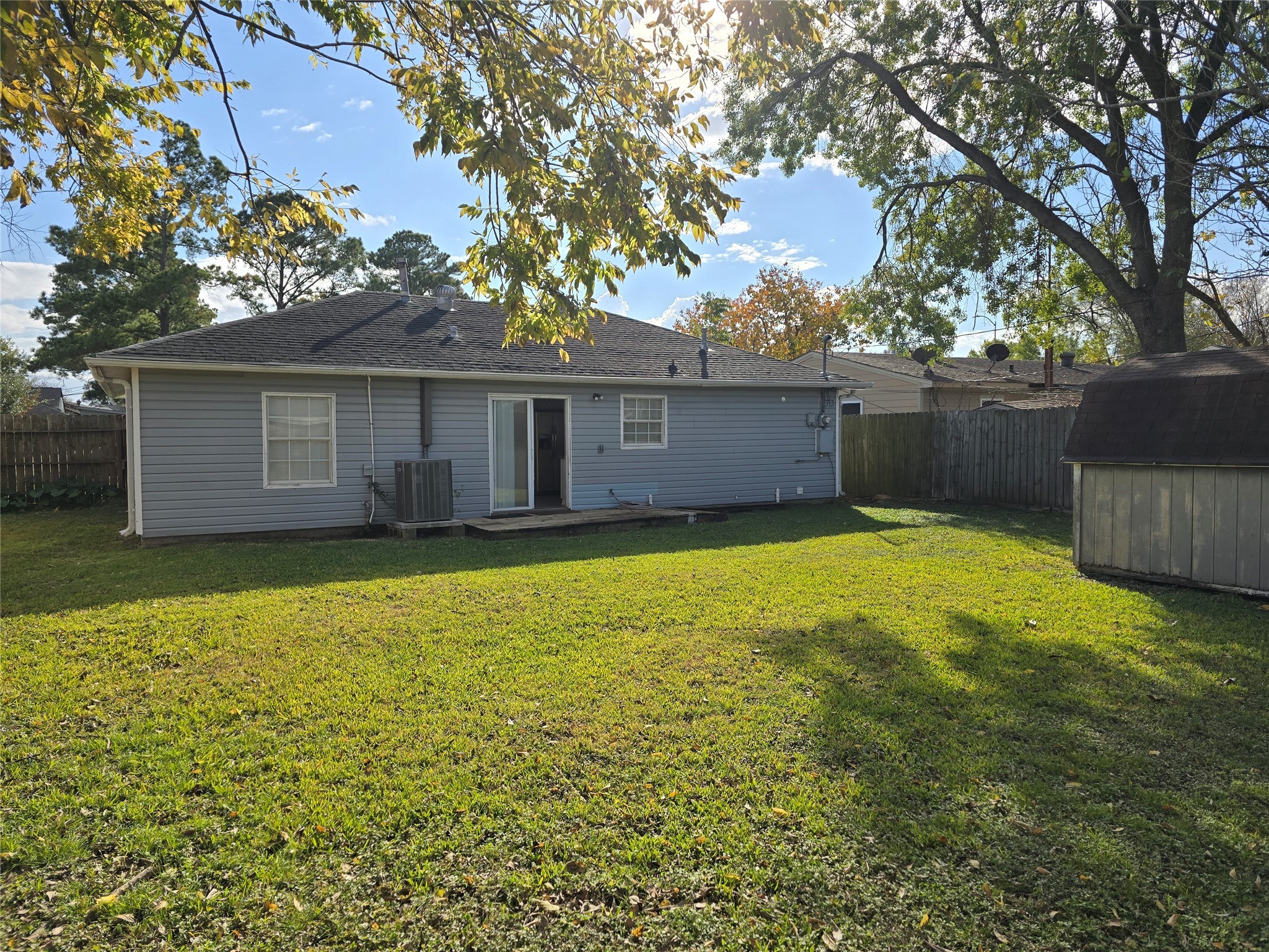 3619 Washington Street Pasadena, TX 77503 - Photo 15 of 16 a view of a house with a backyard