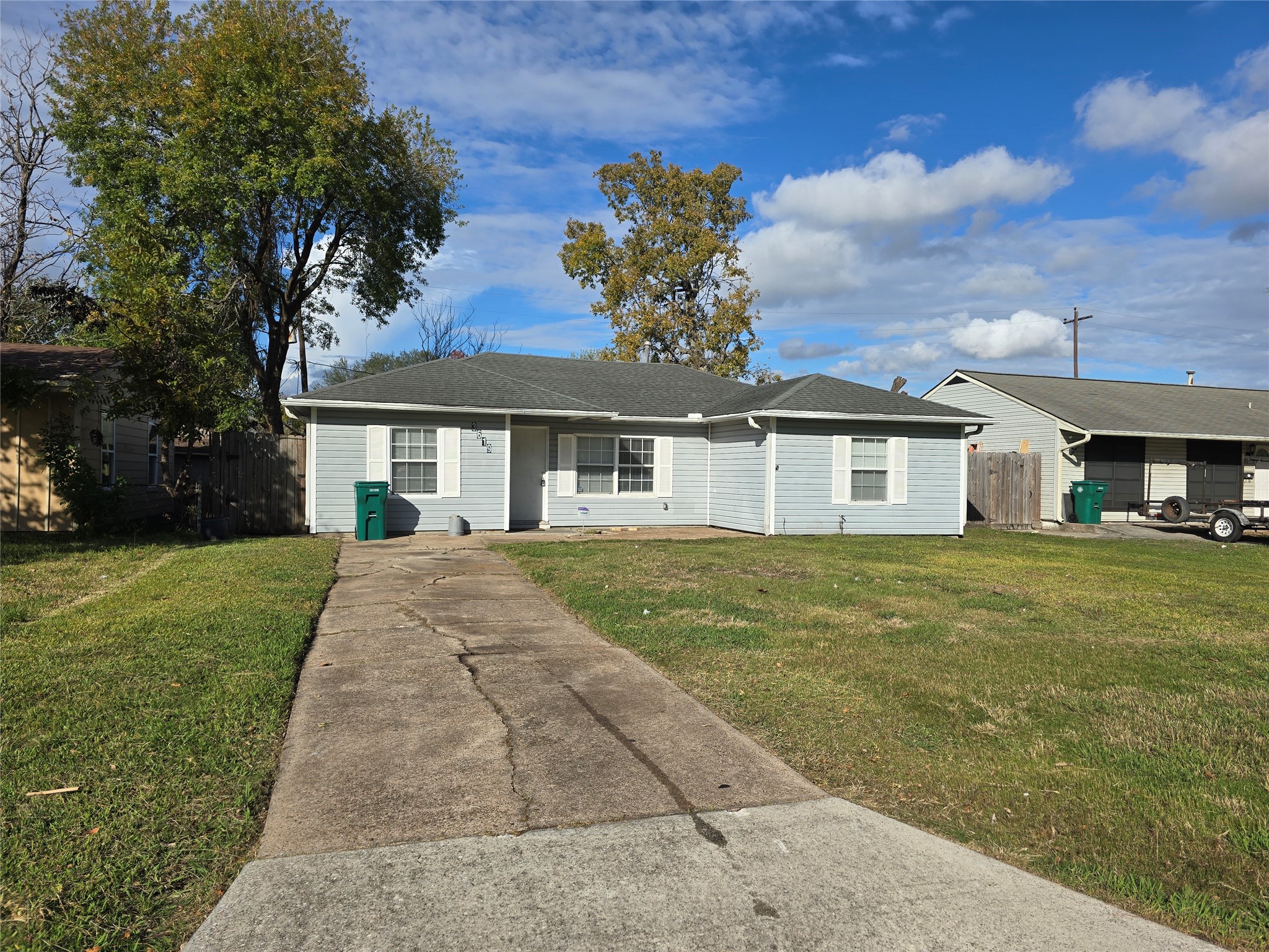 3619 Washington Street Pasadena, TX 77503 - Photo 16 of 16 a front view of a house with a garden