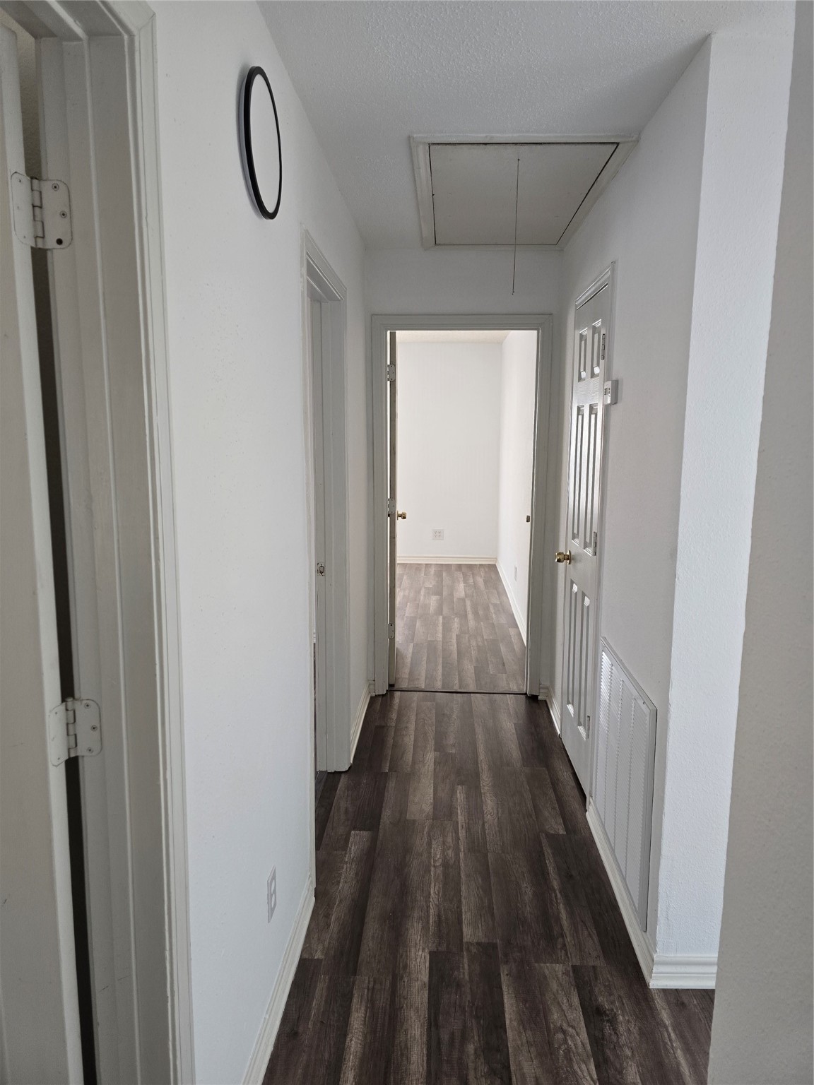 3619 Washington Street Pasadena, TX 77503 - Photo 7 of 16 a view of a bathroom from a hallway