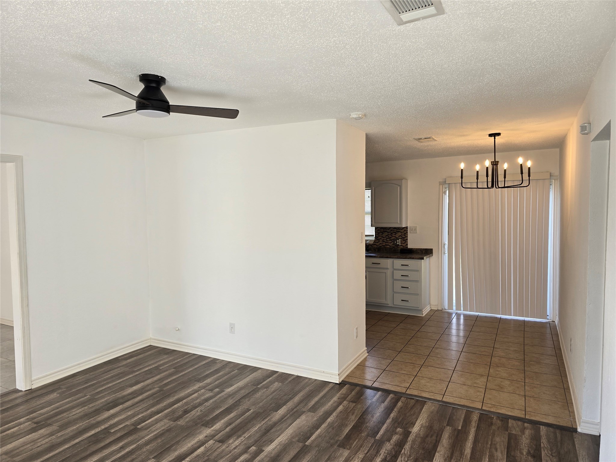 3619 Washington Street Pasadena, TX 77503 - Photo 9 of 16 a view of a hallway with a kitchen