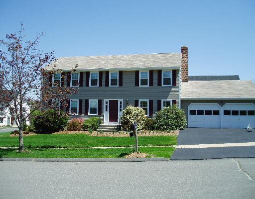 140 Fairchild Road Stratford, CT 06614 - Photo 1 of 1 a front view of a house with a yard and potted plants