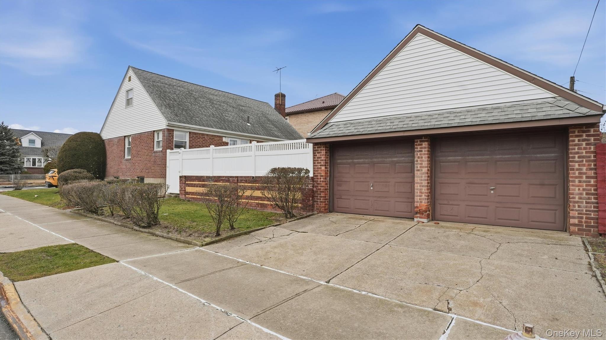 83-57 251st Street Queens, NY 11426 - Photo 2 of 14 a view of a house with garage