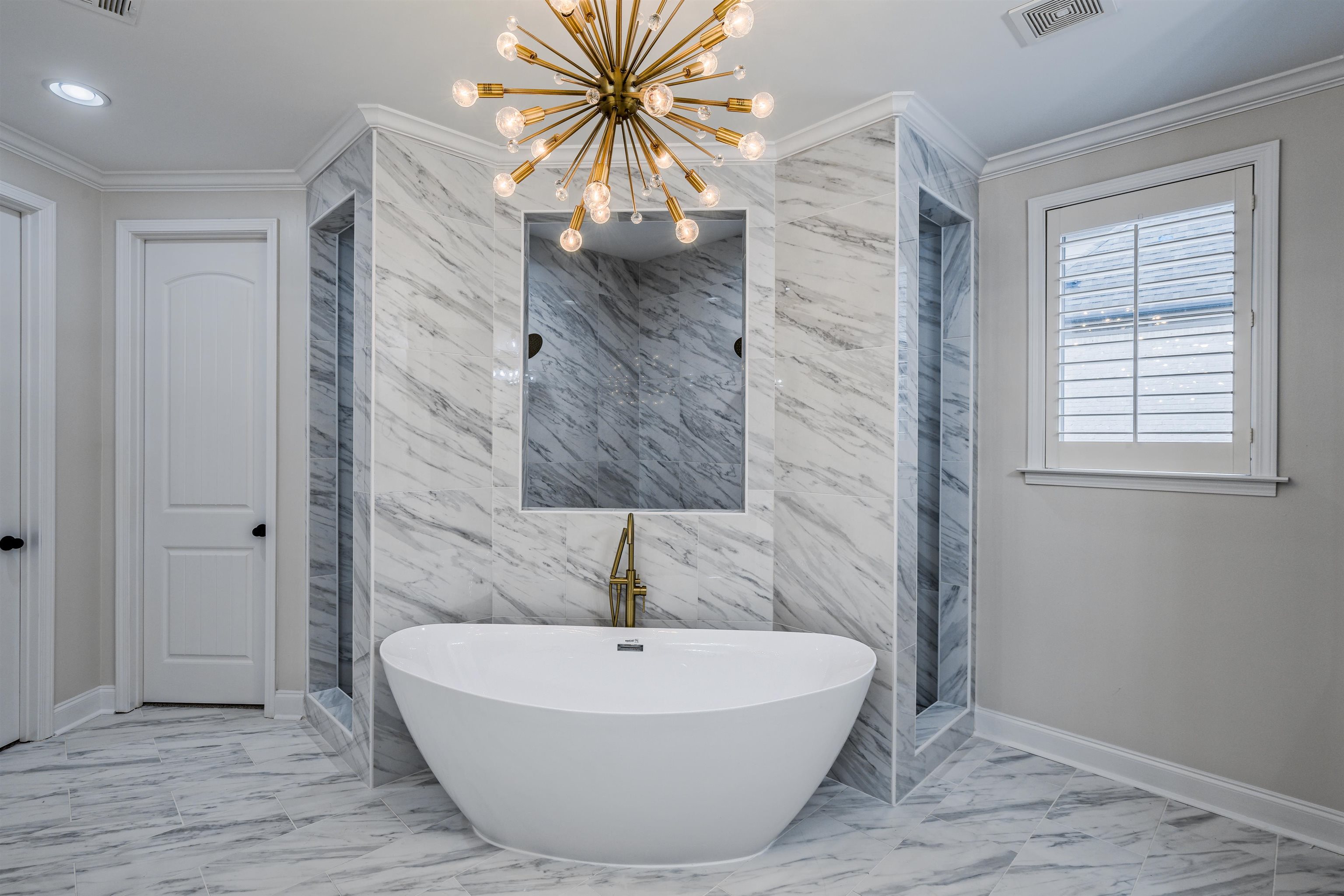 1361 Conser Street Collierville, TN 38017 - Photo 14 of 25 a bathroom with a bathtub and a shower