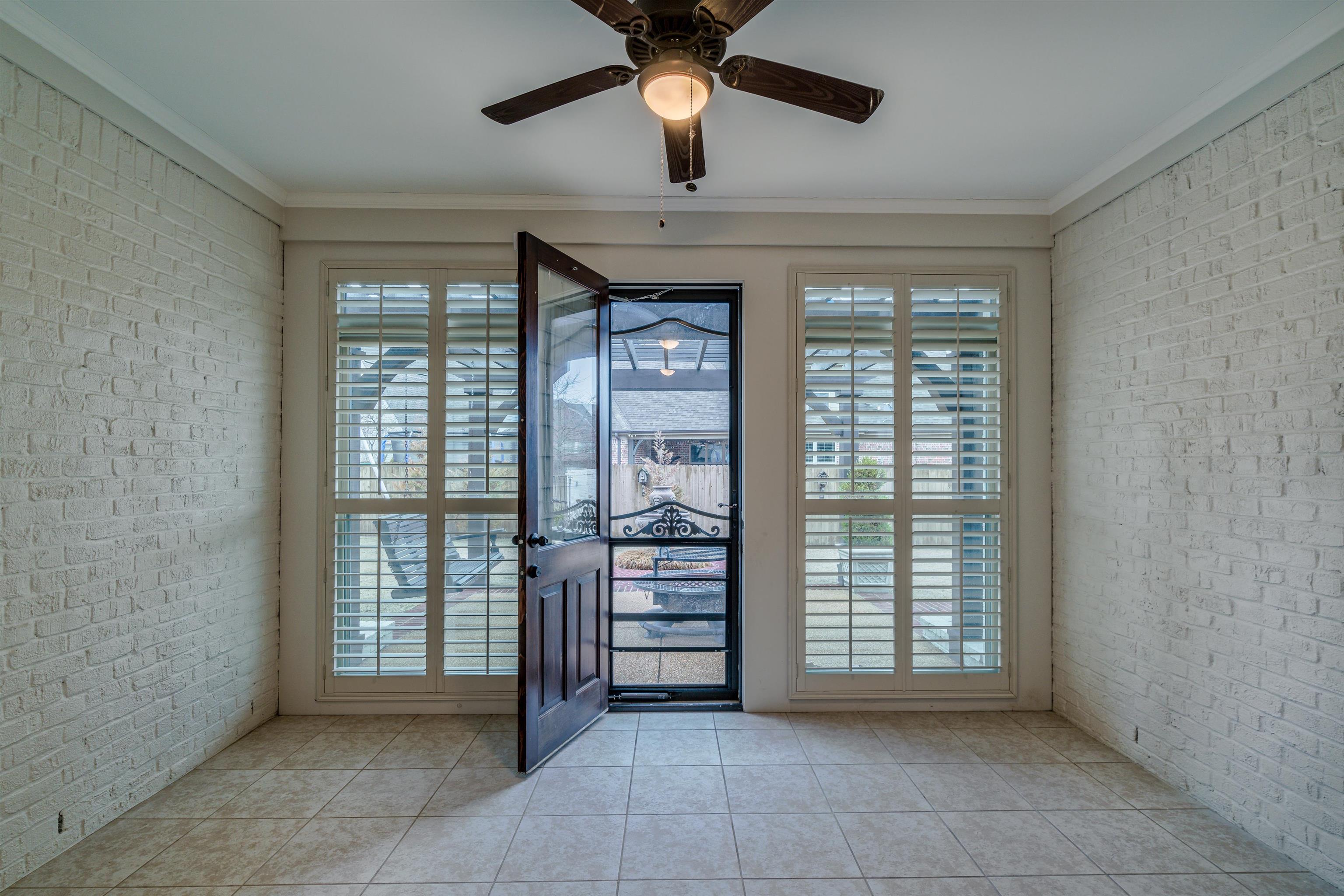 1361 Conser Street Collierville, TN 38017 - Photo 17 of 25 a view of an empty room with a window