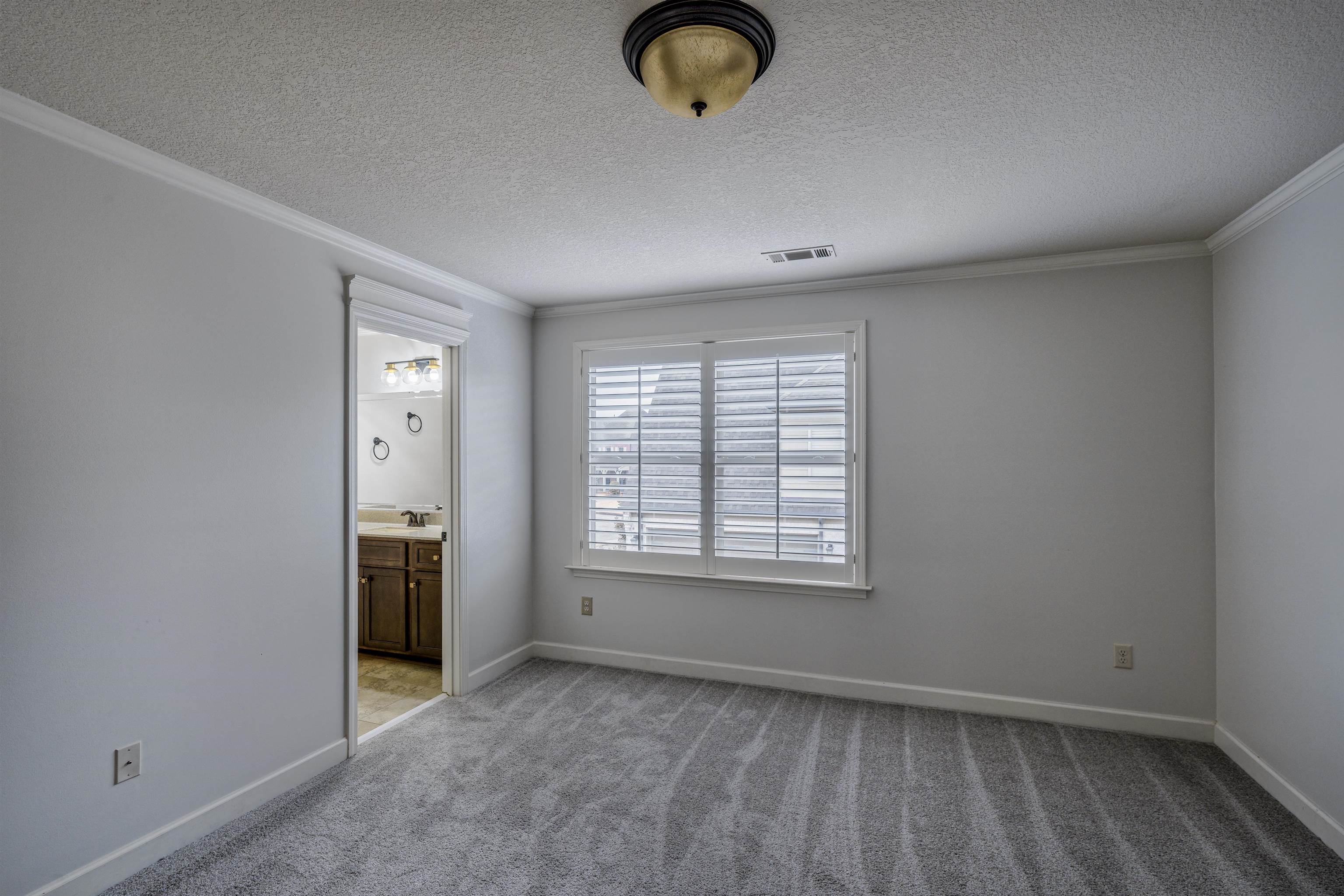 1361 Conser Street Collierville, TN 38017 - Photo 18 of 25 an empty room with windows