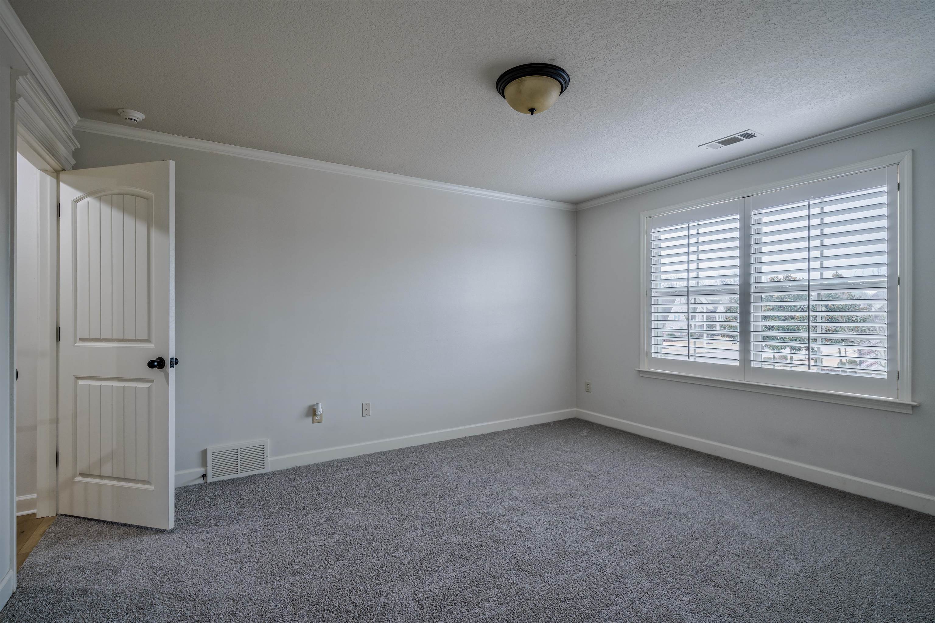 1361 Conser Street Collierville, TN 38017 - Photo 20 of 25 a view of an empty room with a window