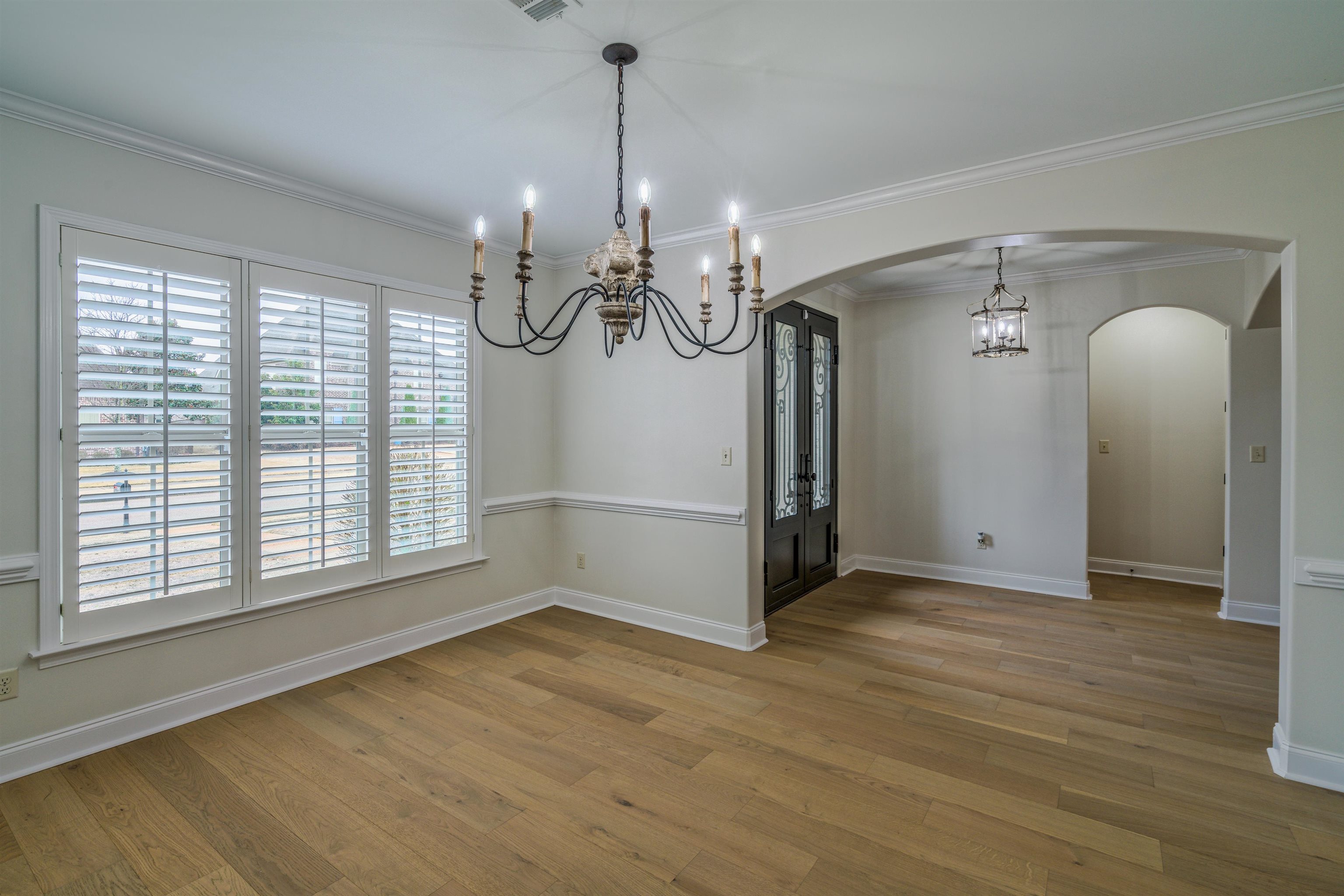 1361 Conser Street Collierville, TN 38017 - Photo 3 of 25 a view of empty room with wooden floor and fan