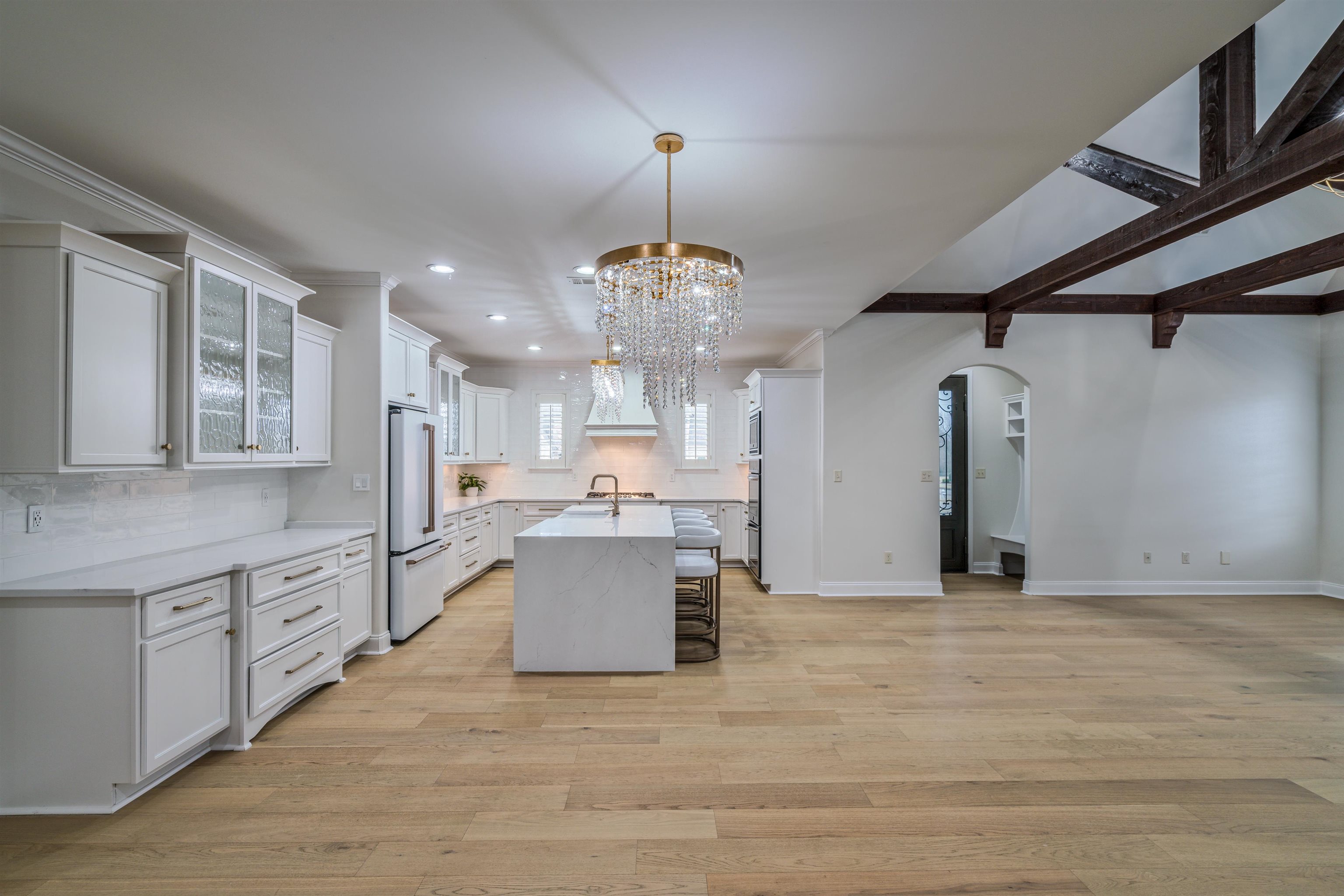 1361 Conser Street Collierville, TN 38017 - Photo 6 of 25 a view of a big room with chandelier and windows