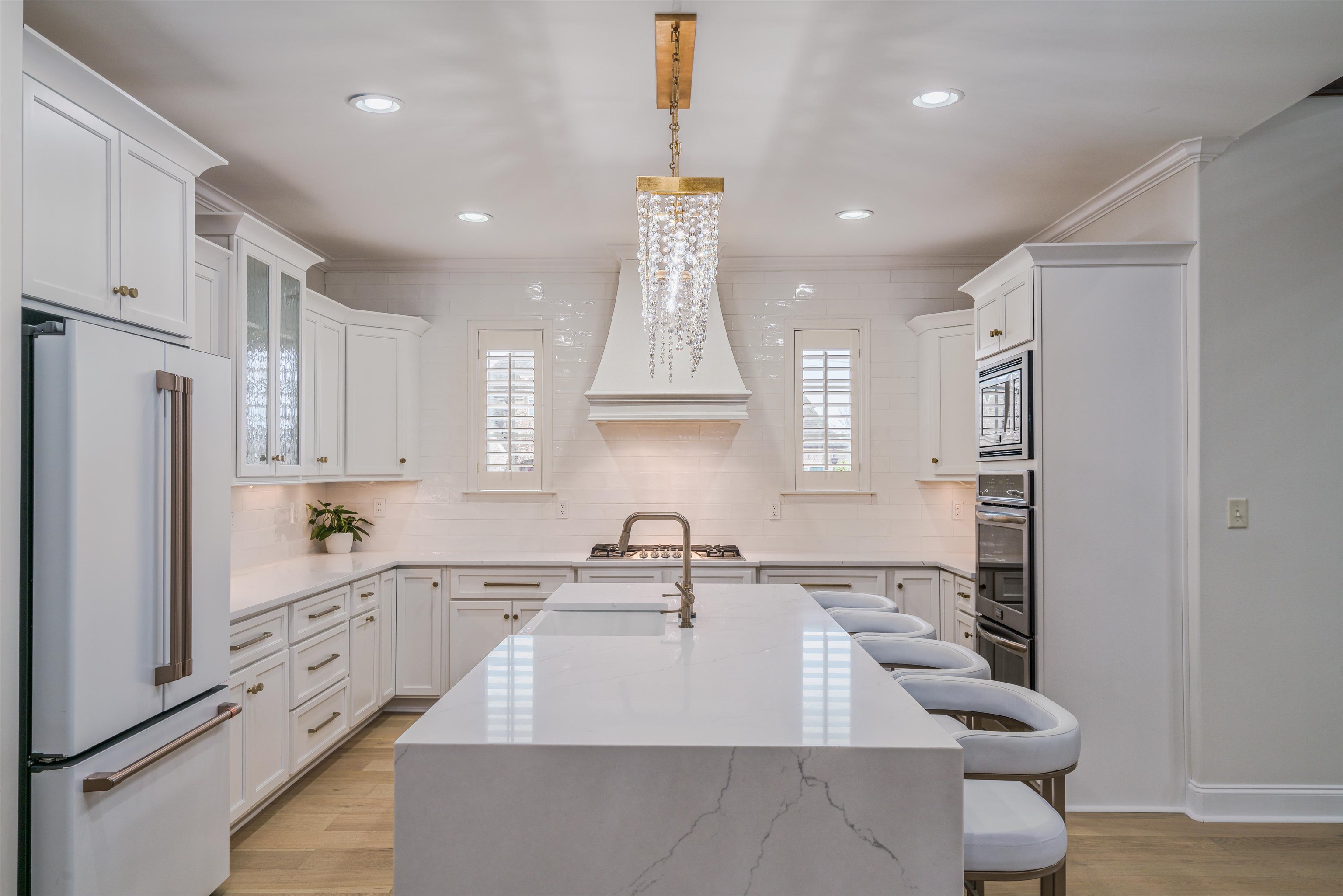 1361 Conser Street Collierville, TN 38017 - Photo 7 of 25 a kitchen with granite countertop a sink stainless steel appliances and cabinets