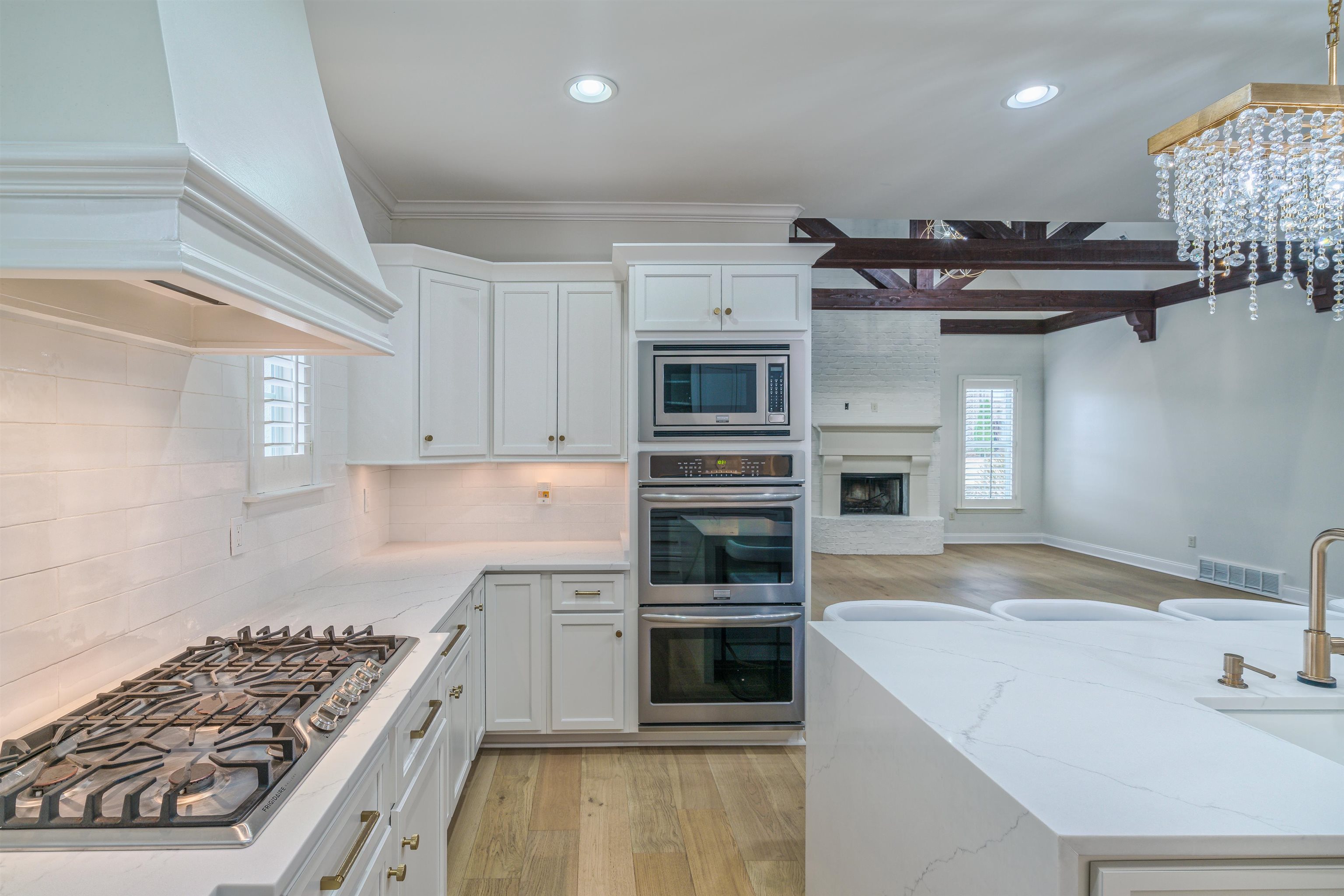 1361 Conser Street Collierville, TN 38017 - Photo 8 of 25 a kitchen that has a sink and a stove