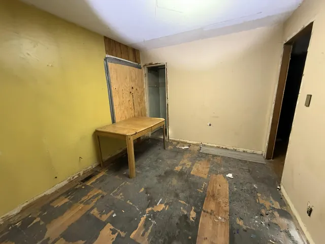 a view of a room with a door