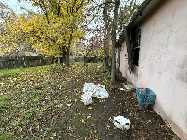 a backyard of a house with lots of green space