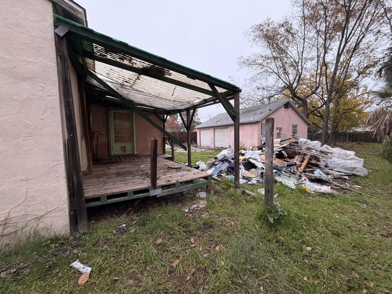 3440 Edison Avenue Sacramento, CA 95821 - Photo 5 of 33 a view of a backyard with a patio table and chairs