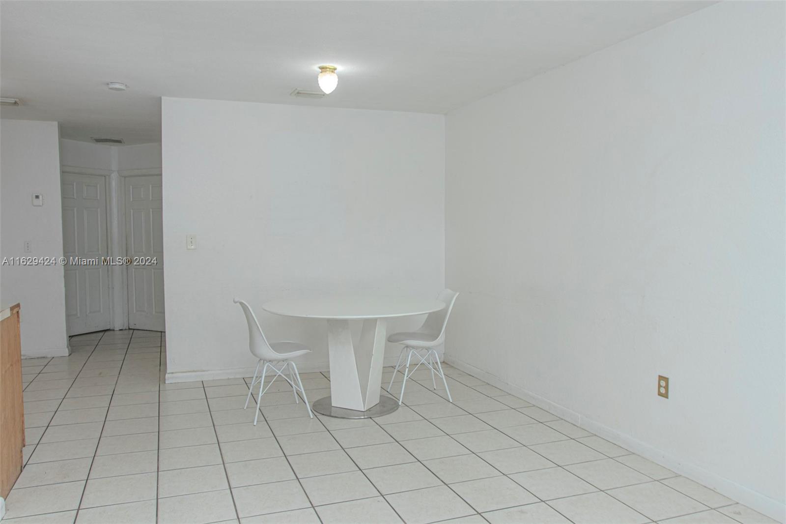 14316 Southwest 283rd Street, Unit 14316 Homestead, FL 33033 - Photo 3 of 6 a view of an empty room