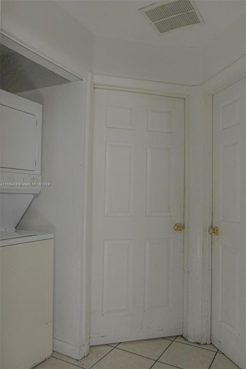14316 Southwest 283rd Street, Unit 14316 Homestead, FL 33033 - Photo 5 of 6 a view of cupboard